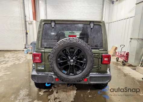 2023 Jeep Wrangler Sahara 4Xe from USA, damaged, VIN 1C4JJXP65PW528726